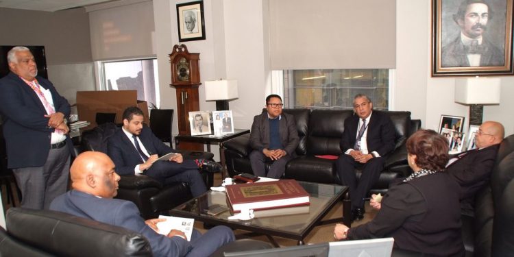 Carlos NY Director pasaporte